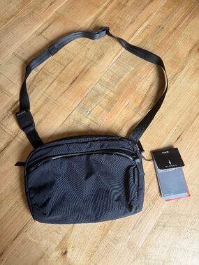 Alpaka Flight Sling - New With Tags